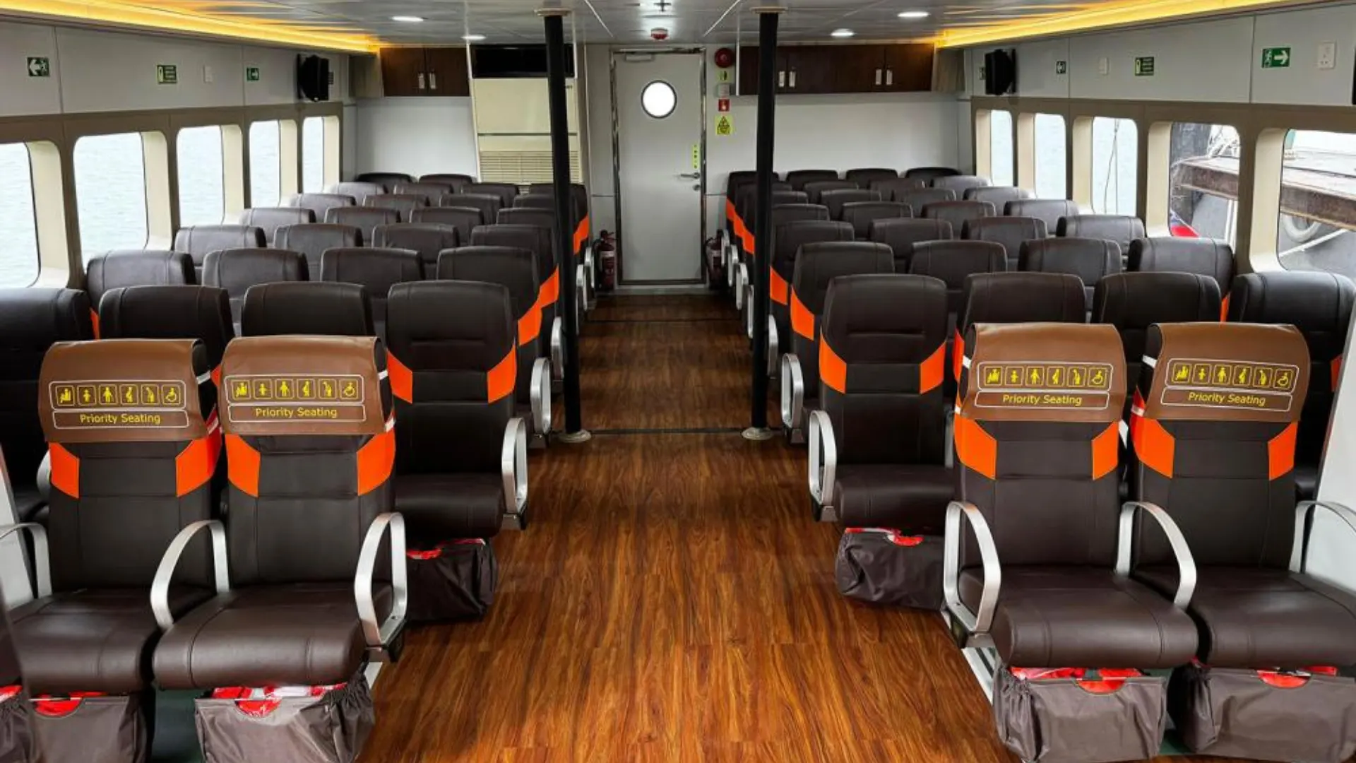 Front cabin interior of Dcamel ALX Fast Ferry featuring comfortable padded seats and air conditioning