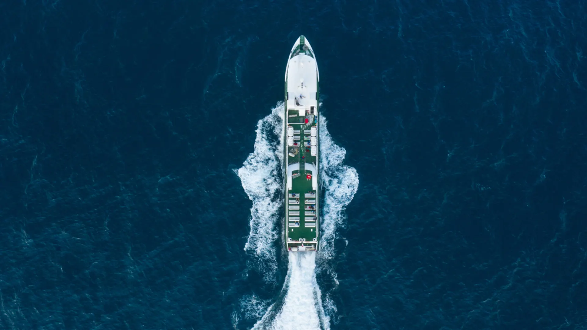 Eka Jaya Fast Ferry cruising on the ocean from top view for Nusa Lembongan to Gili fast boat service