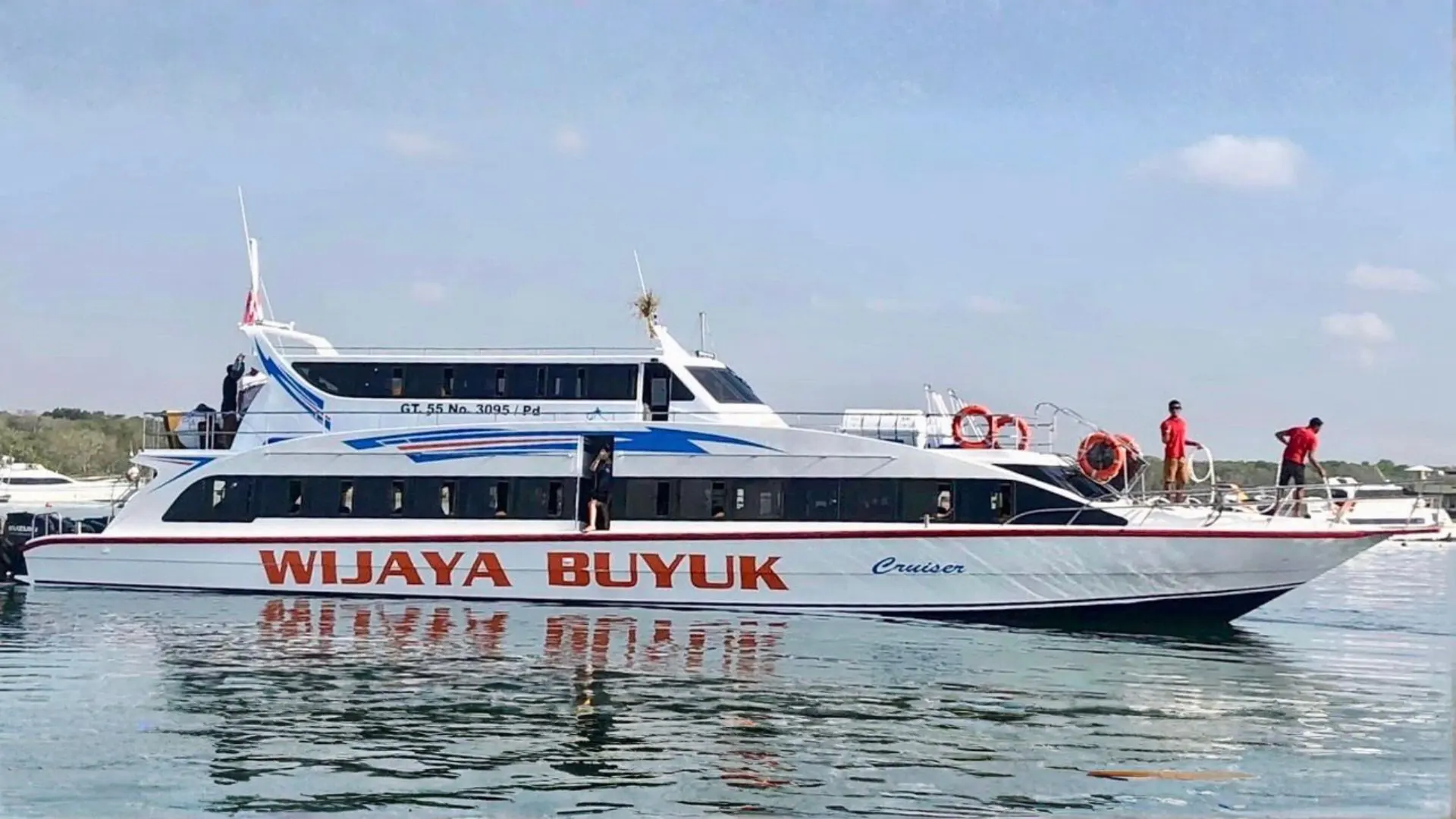 Wijaya Buyuk Fast Boat preparing for departure with professional crew on board at Bali fast boat route