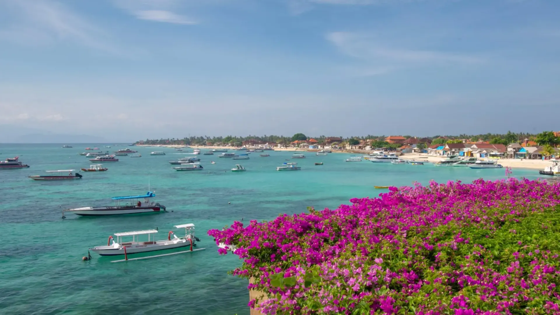 Lembongan Fast Boat at Jungut Batu Beach showcasing scenic coastline and visit the best Lembongan destinations